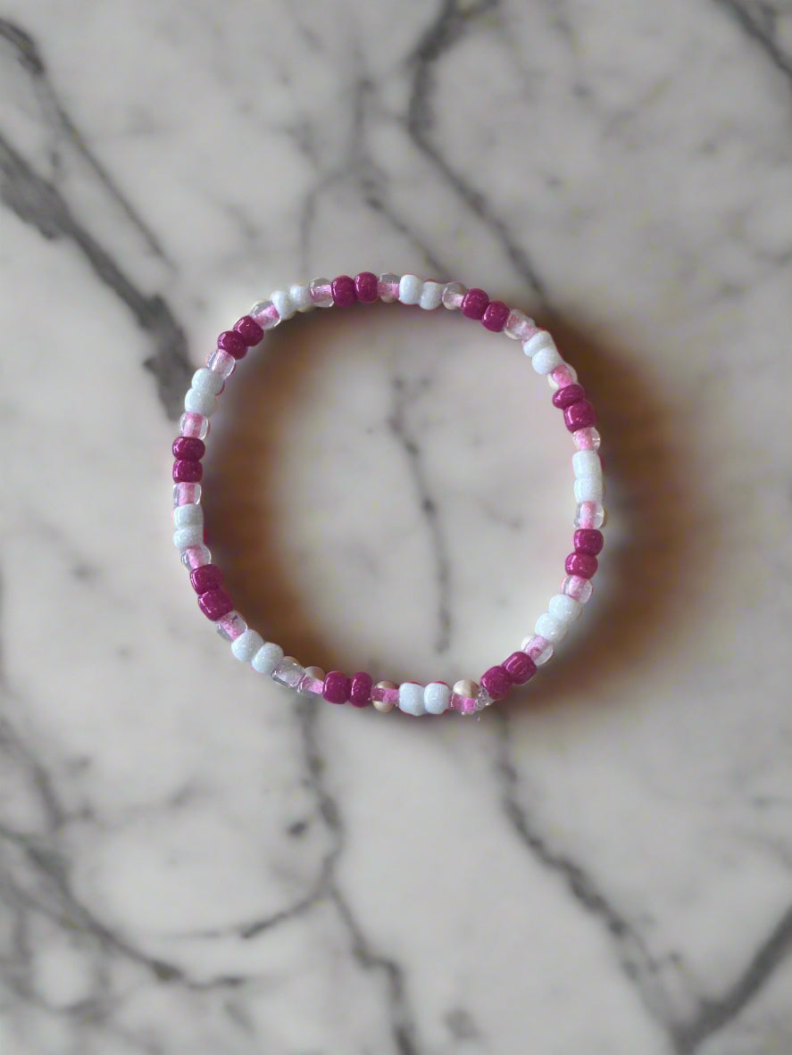pink and white bracelet