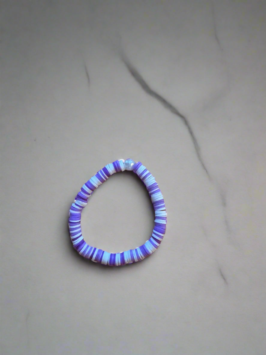 purple and white bracelet