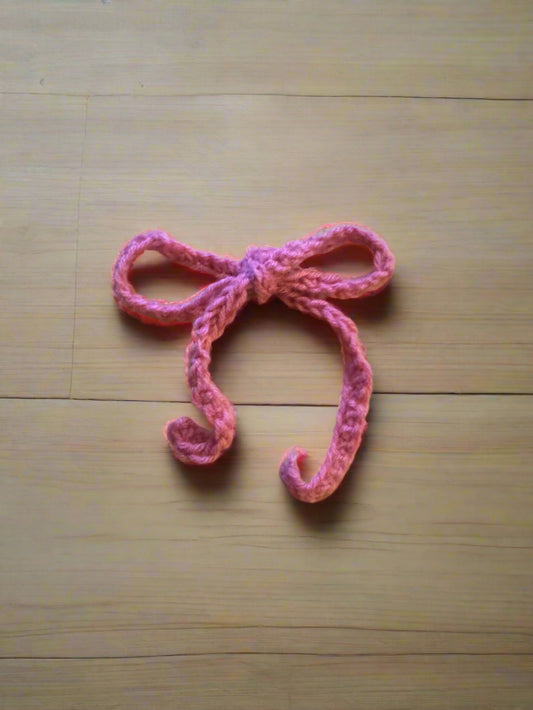 Coral crochet bow