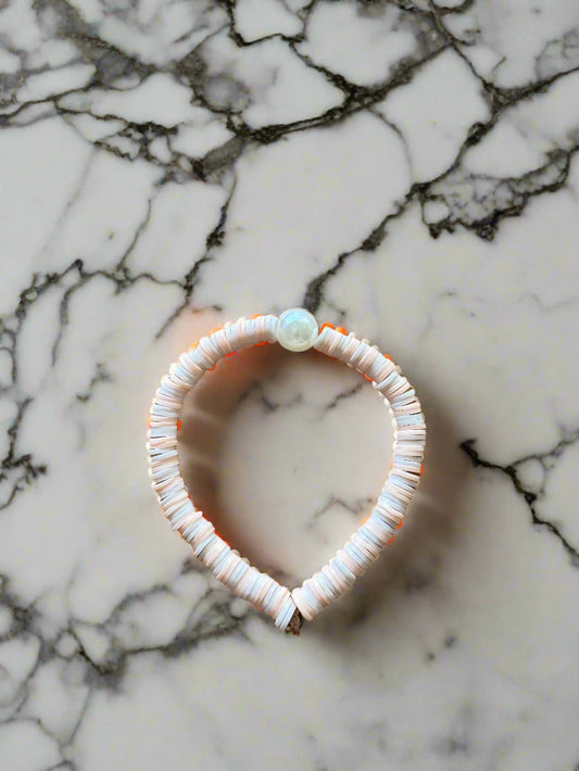 White and orange bracelet