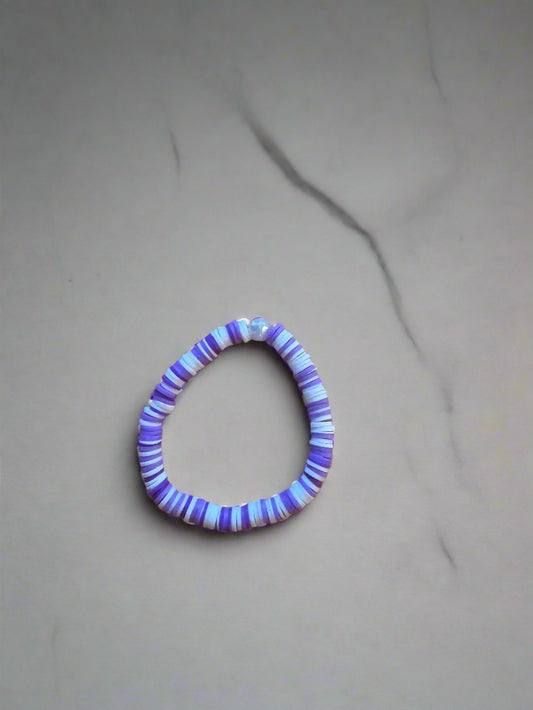 purple and white bracelet
